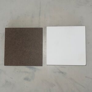 Mini canvases 2 1/2 x 2 1/2 inches with velcro that can attached to surfaces